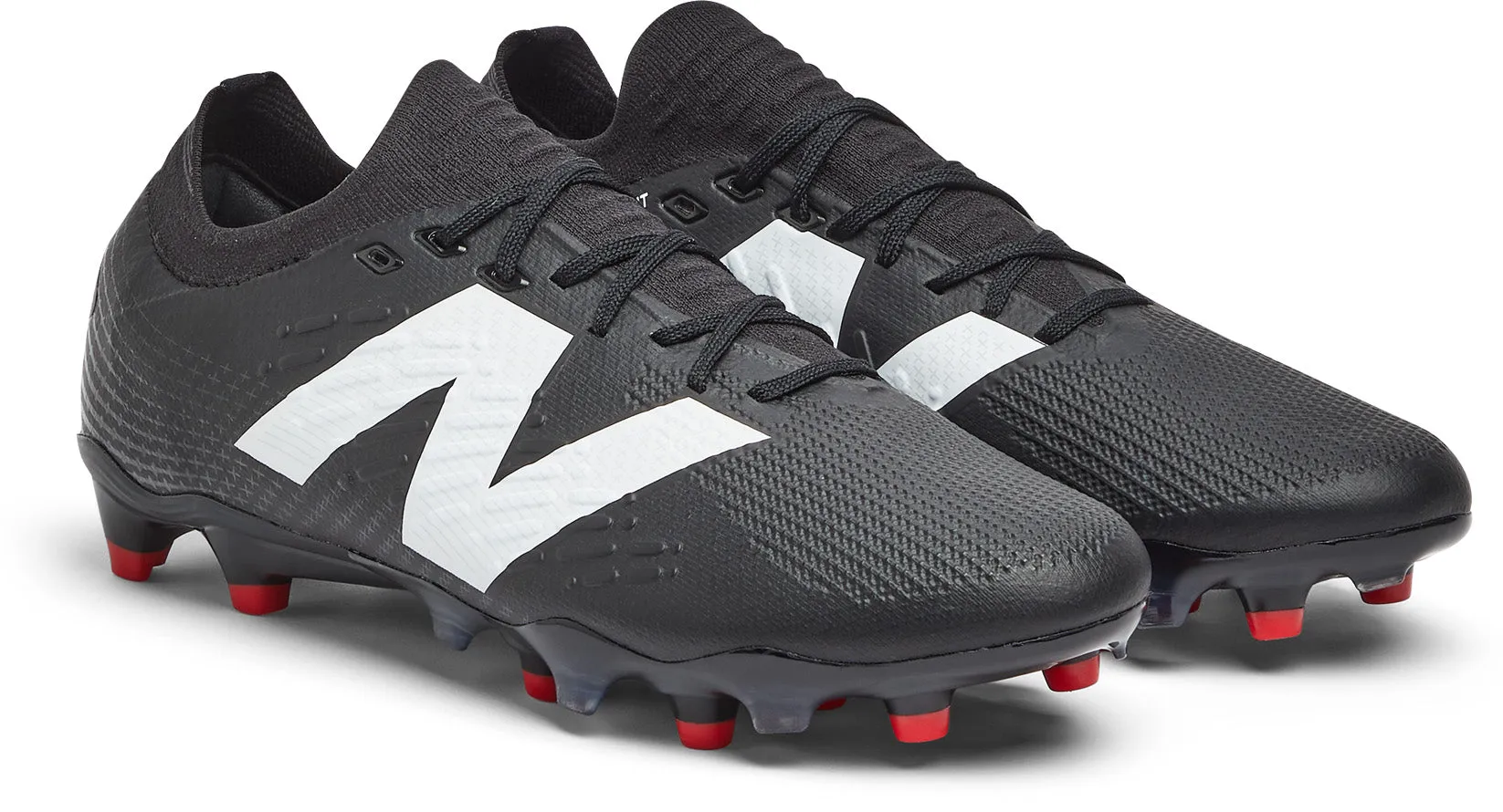 Tekela Pro V4  Low Firm Ground Football Boots