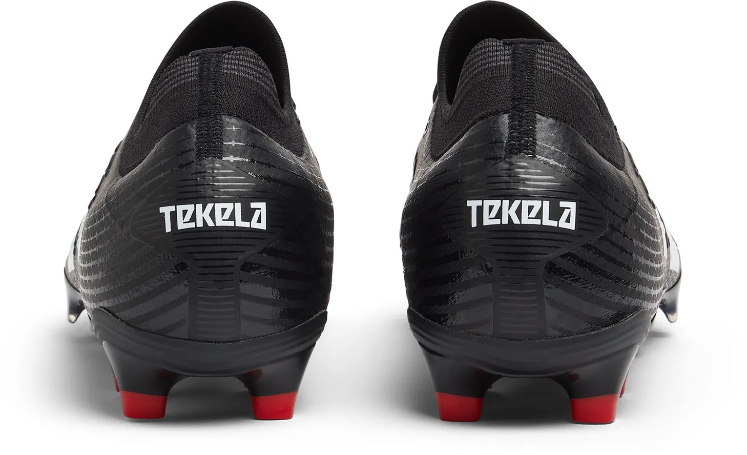 Tekela Pro V4  Low Firm Ground Football Boots